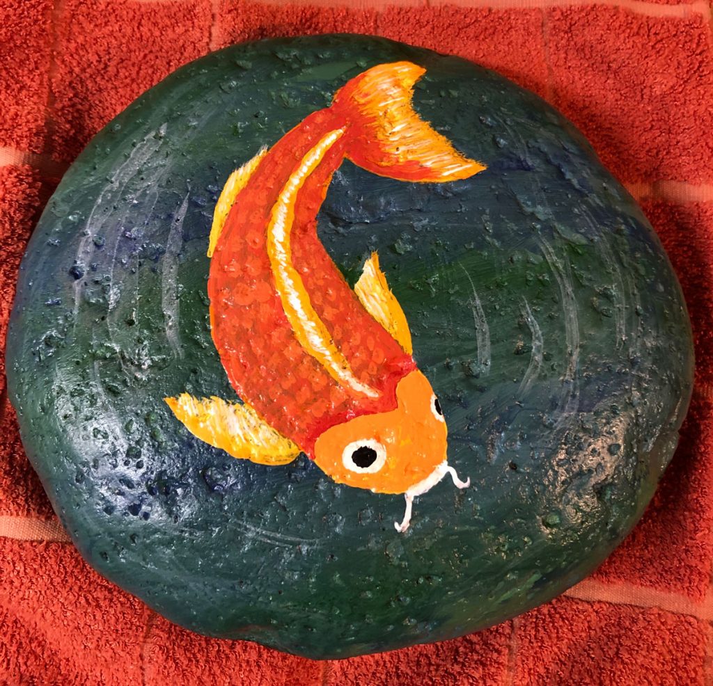 Goldfish painting on rock